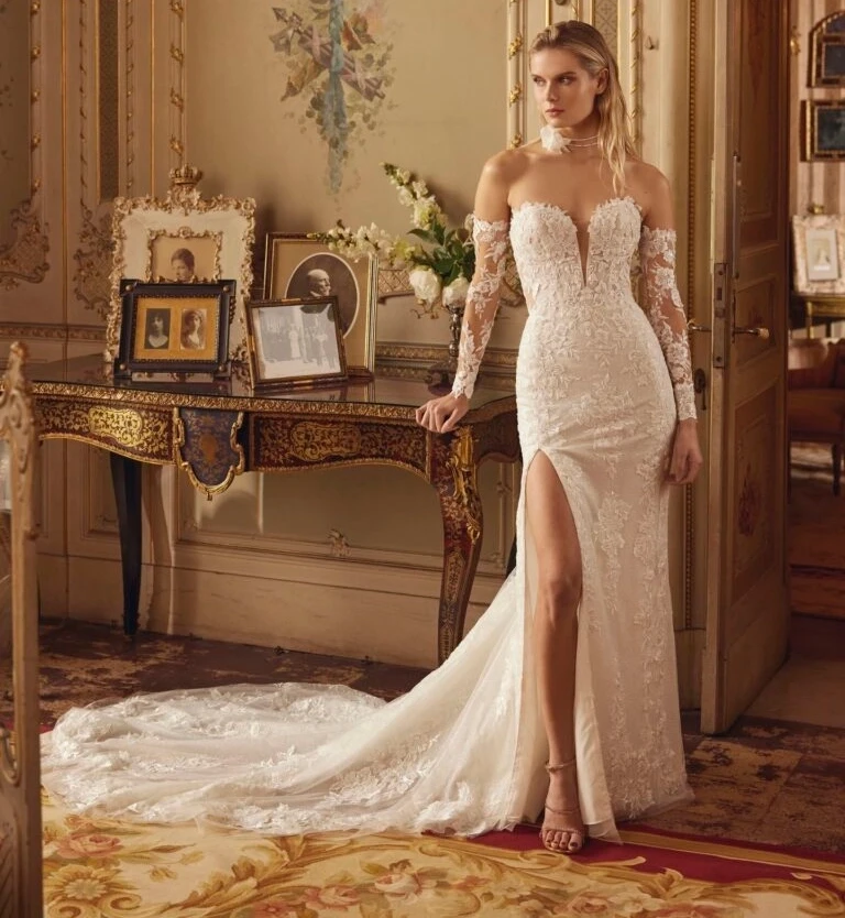 Model wearing a white gown by Demetrios